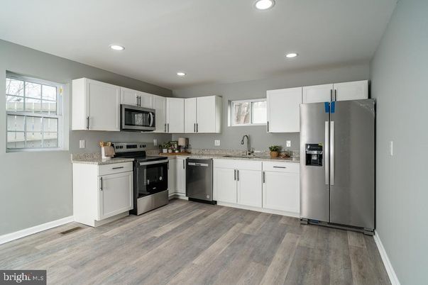 Interior, Kitchen, Recessed Lighting, Stainless Steel Appliances, Wood Texture Flooring