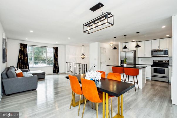 Dining room, Interior, Kitchen, Living room, Pendant Lights, Recessed Lighting, Stainless Steel Appliances, Wood Texture Flooring
