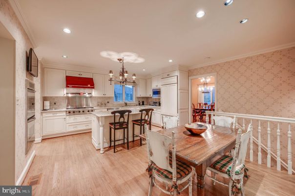 Chandelier, Dining room, Interior, Kitchen, Pendant Lights, Recessed Lighting, Stainless Steel Appliances, Wood Texture Flooring