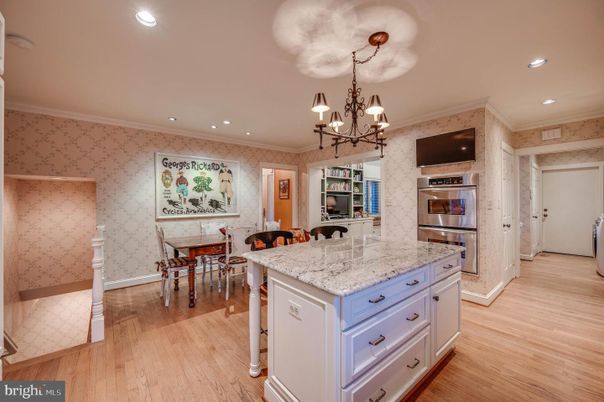 Chandelier, Dining room, Interior, Kitchen, Recessed Lighting, Stainless Steel Appliances, Wood Texture Flooring