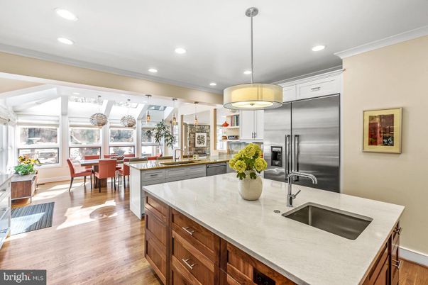 Dining room, Interior, Kitchen, Pendant Lights, Recessed Lighting, Stainless Steel Appliances, Wood Texture Flooring