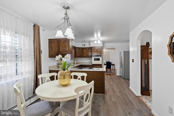 Dining room, Interior, Kitchen, Pendant Lights, Stainless Steel Appliances, Wood Texture Flooring