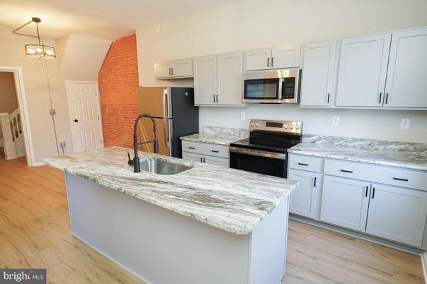 Interior, Kitchen, Pendant Lights, Stainless Steel Appliances, Wood Texture Flooring