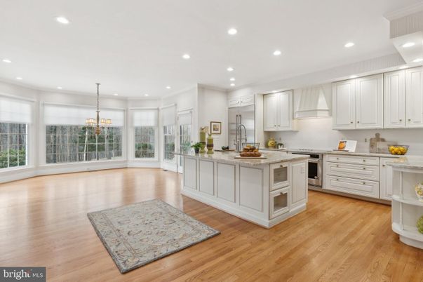 Chandelier, Interior, Kitchen, Recessed Lighting, Stainless Steel Appliances, Wood Texture Flooring