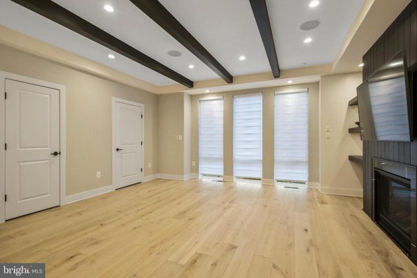 Empty room, Fireplace, Interior, Recessed Lighting, Wooden Beams, Wood Texture Flooring