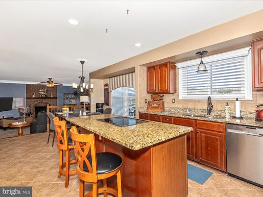 Dining room, Fireplace, Interior, Kitchen, Pendant Lights, Recessed Lighting, Stainless Steel Appliances, Stone Walls