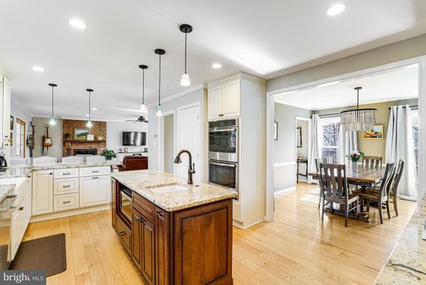 Dining room, Interior, Kitchen, Pendant Lights, Recessed Lighting, Stainless Steel Appliances, Stone Walls, Wood Texture Flooring
