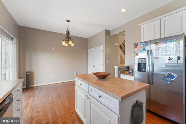 Chandelier, Interior, Kitchen, Recessed Lighting, Stainless Steel Appliances, Wood Texture Flooring