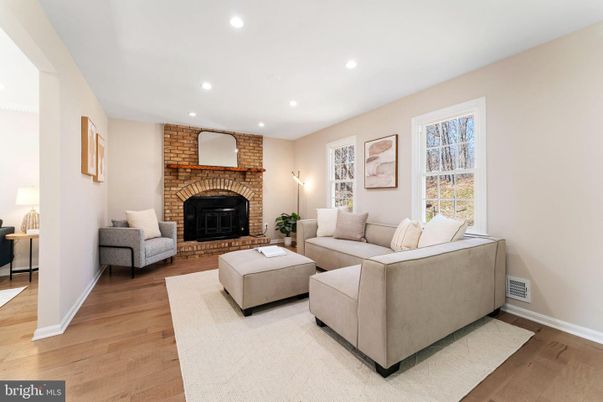 Fireplace, Interior, Living room, Recessed Lighting, Stone Walls, Wood Texture Flooring