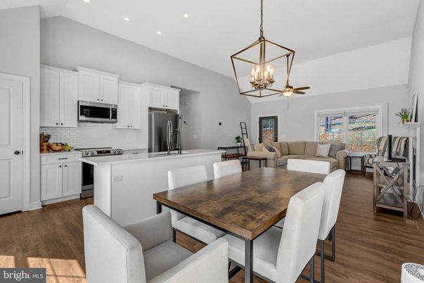 Dining room, Interior, Kitchen, Living room, Pendant Lights, Recessed Lighting, Stainless Steel Appliances, Wood Texture Flooring