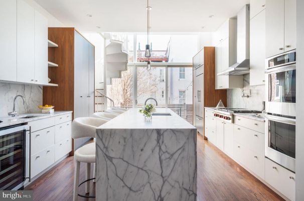 Interior, Kitchen, Marble Walls, Pendant Lights, Recessed Lighting, Stainless Steel Appliances, Wood Texture Flooring