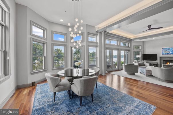 Dining room, Fireplace, Interior, Living room, Pendant Lights, Recessed Lighting, Wood Texture Flooring