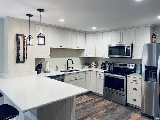 Interior, Kitchen, Pendant Lights, Recessed Lighting, Stainless Steel Appliances, Wood Texture Flooring