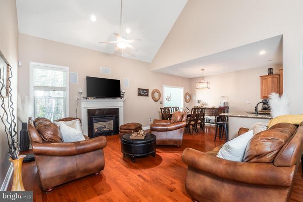 Dining room, Fireplace, Interior, Living room, Pendant Lights, Recessed Lighting, Wood Texture Flooring