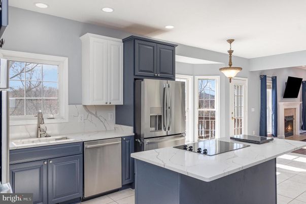Fireplace, Interior, Kitchen, Pendant Lights, Recessed Lighting, Stainless Steel Appliances