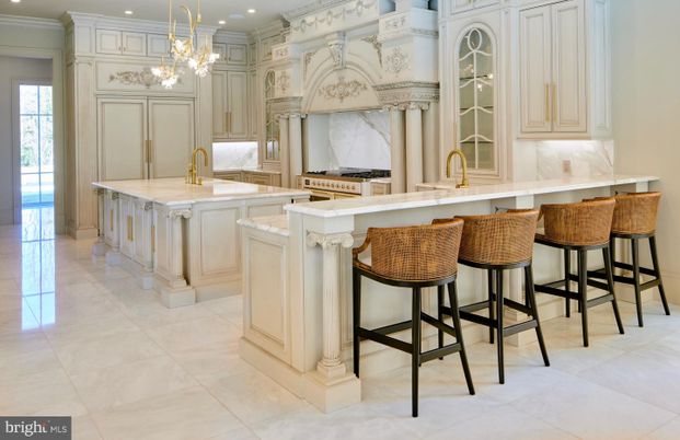 Interior, Kitchen, Marble Walls, Pendant Lights, Recessed Lighting, Stainless Steel Appliances