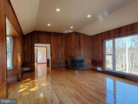 Empty room, Fireplace, Interior, Recessed Lighting, Wood Texture Flooring, Wooden Walls