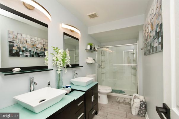 Bathroom, Dual Sink Vanities, Glass Shower, Interior, Wood Texture Flooring