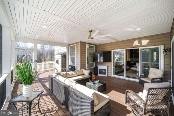 Exterior, Fireplace, Interior, Living room, Recessed Lighting, Wood Texture Flooring