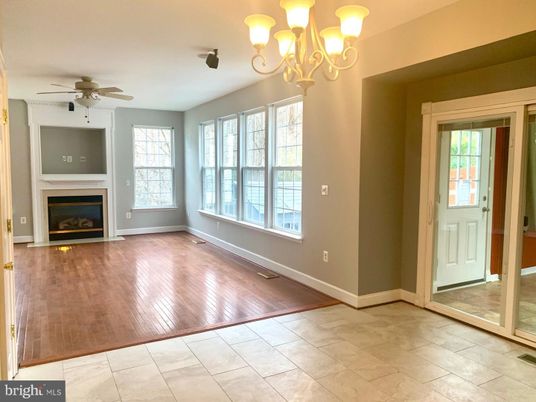 Chandelier, Empty room, Fireplace, Interior, Wood Texture Flooring