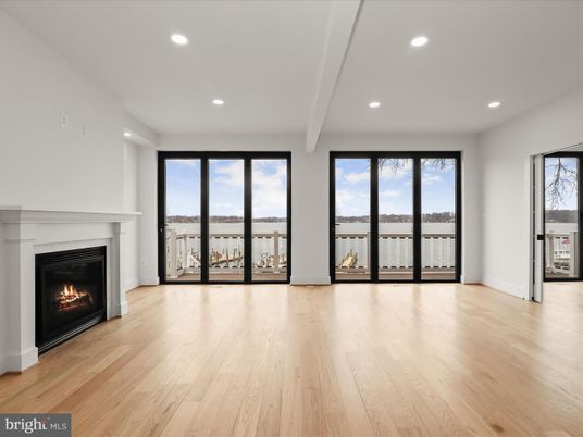 Empty room, Fireplace, Interior, Recessed Lighting, Water, Wood Texture Flooring