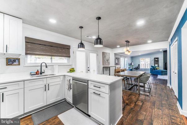 Dining room, Interior, Kitchen, Pendant Lights, Recessed Lighting, Stainless Steel Appliances, Wood Texture Flooring
