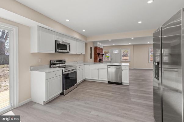 Interior, Kitchen, Recessed Lighting, Stainless Steel Appliances, Wood Texture Flooring