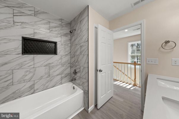 Bathroom, Interior, Marble Walls, Recessed Lighting, Wood Texture Flooring