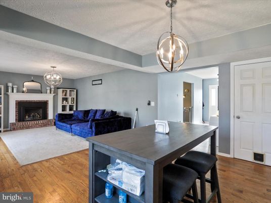 Dining room, Fireplace, Interior, Living room, Pendant Lights, Wood Texture Flooring