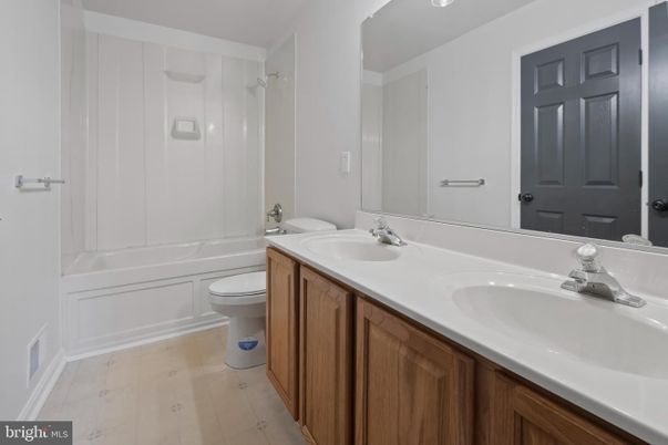 Bathroom, Dual Sink Vanities, Glass Shower, Interior, Wood Texture Flooring