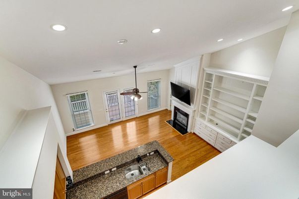 Fireplace, Interior, Pendant Lights, Recessed Lighting, Wood Texture Flooring