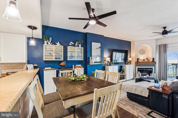 Dining room, Fireplace, Interior, Pendant Lights, Wood Texture Flooring