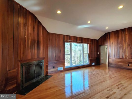 Empty room, Fireplace, Interior, Recessed Lighting, Wood Texture Flooring, Wooden Walls