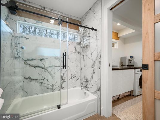 Bathroom, Glass Shower, Interior, Marble Walls, Recessed Lighting, Wood Texture Flooring