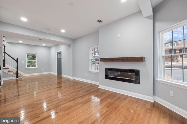 Empty room, Fireplace, Interior, Recessed Lighting, Wood Texture Flooring
