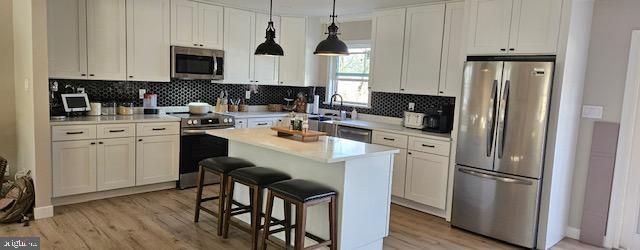 Interior, Kitchen, Pendant Lights, Stainless Steel Appliances, Wood Texture Flooring