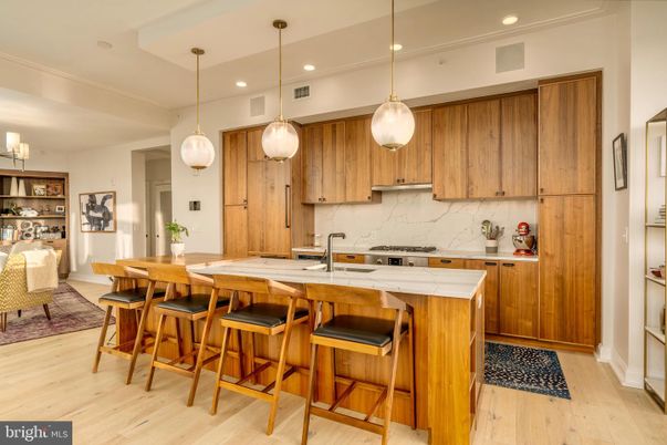 Interior, Kitchen, Marble Walls, Pendant Lights, Recessed Lighting, Wood Texture Flooring