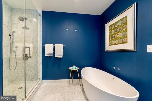 Bathroom, Free Standing Baths, Glass Shower, Interior, Marble, Marble Walls, Recessed Lighting