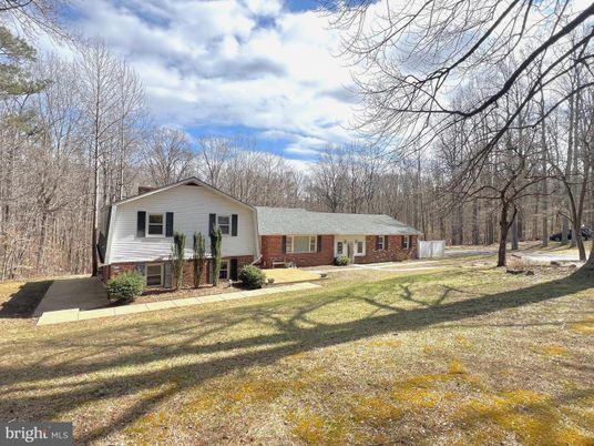 Backyard, Exterior, Facade, Brick Facade, Raised Ranch