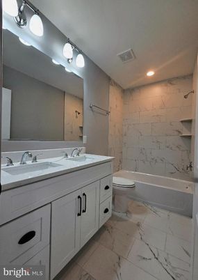 Bathroom, Dual Sink Vanities, Interior, Marble, Marble Walls, Recessed Lighting
