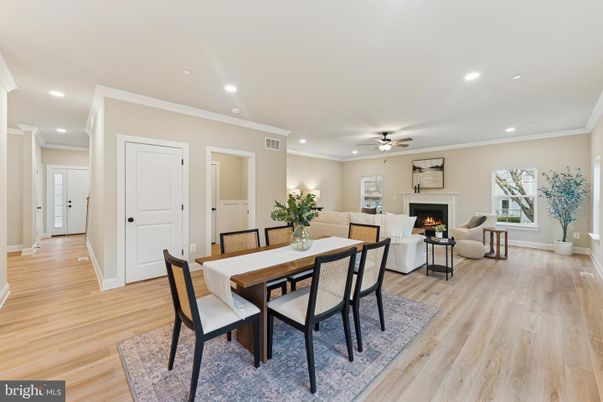 Dining room, Fireplace, Interior, Living room, Recessed Lighting, Wood Texture Flooring