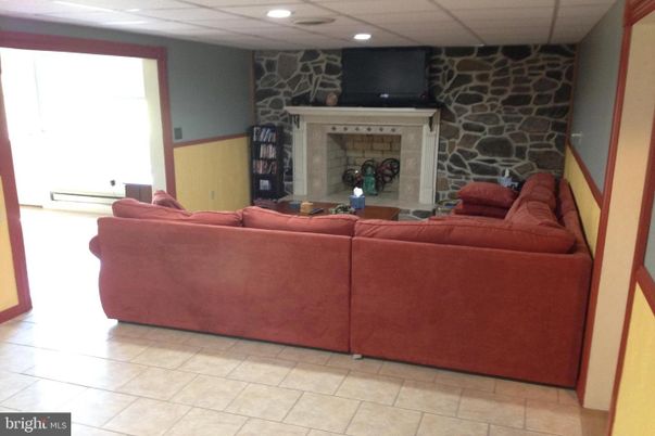 Fireplace, Interior, Living room, Recessed Lighting, Stone Walls