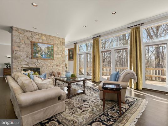 Fireplace, Interior, Living room, Recessed Lighting, Stone Walls, Wood Texture Flooring