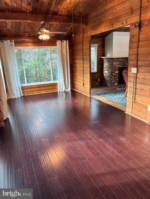 Empty room, Fireplace, Interior, Stone Walls, Wooden Beams, Wooden Ceilings, Wood Texture Flooring, Wooden Walls
