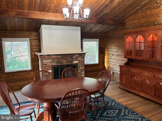 Chandelier, Dining room, Fireplace, Interior, Wooden Beams, Wooden Ceilings, Wood Texture Flooring, Wooden Walls