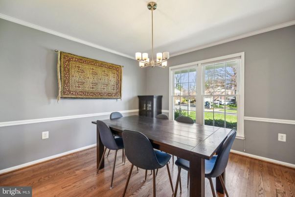 Chandelier, Dining room, Fireplace, Interior, Pendant Lights, Wood Texture Flooring