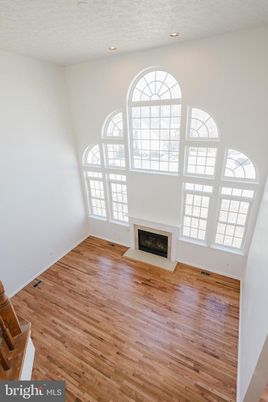 Empty room, Fireplace, Interior, Recessed Lighting, Wood Texture Flooring