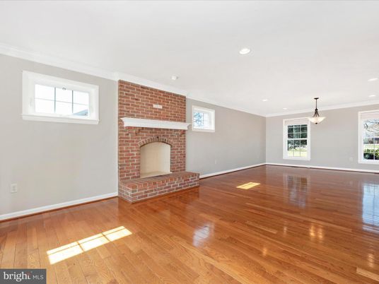 Empty room, Fireplace, Interior, Pendant Lights, Recessed Lighting, Stone Walls, Wood Texture Flooring