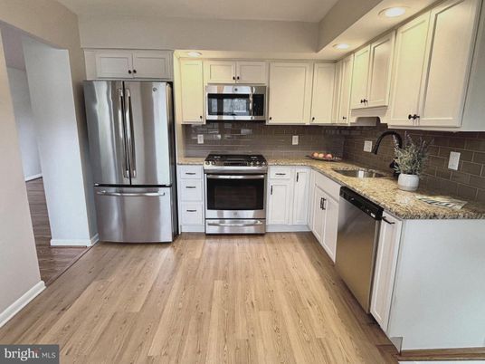 Interior, Kitchen, Recessed Lighting, Stainless Steel Appliances, Wood Texture Flooring