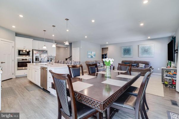 Dining room, Interior, Kitchen, Living room, Pendant Lights, Recessed Lighting, Stainless Steel Appliances, Wood Texture Flooring